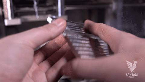 Break-Out-Bottle-Opener.gif